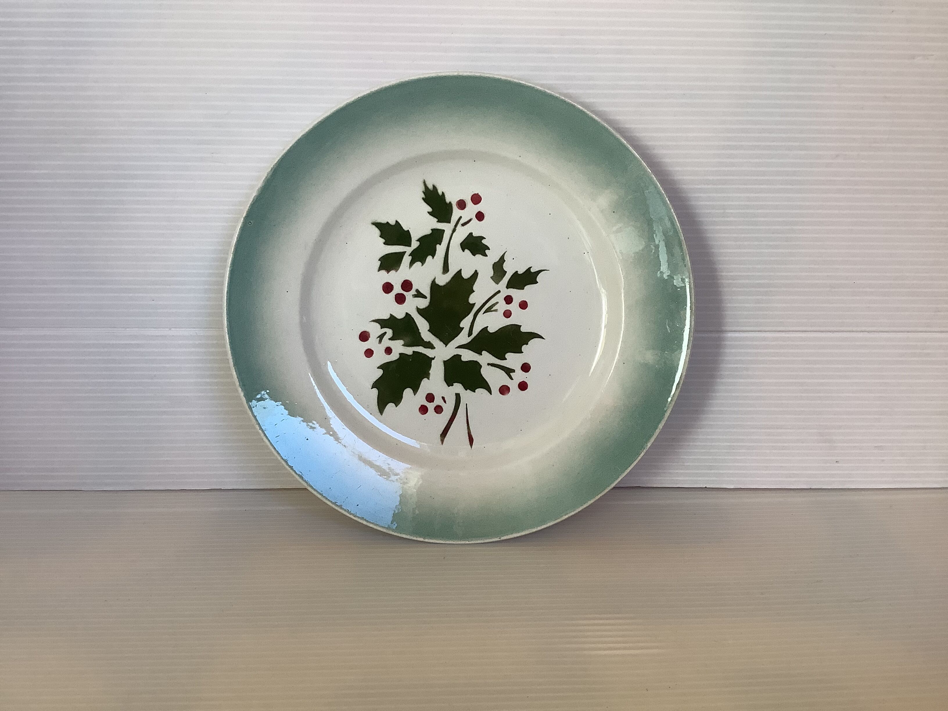 Old earthenware plate holly pattern