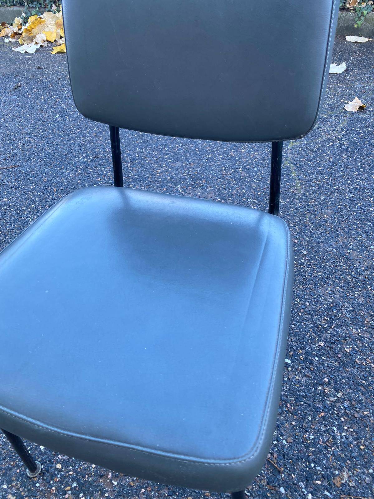 Vintage steel and dark green leather chair from the 60s