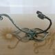Pair of green lacquered wrought iron wall hooks, art deco, 1930s 40s
