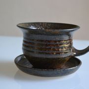 1970s ceramic cup and saucer signed
