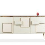 Geometric sideboard in glass and gilded brass. Contemporary Italian work.