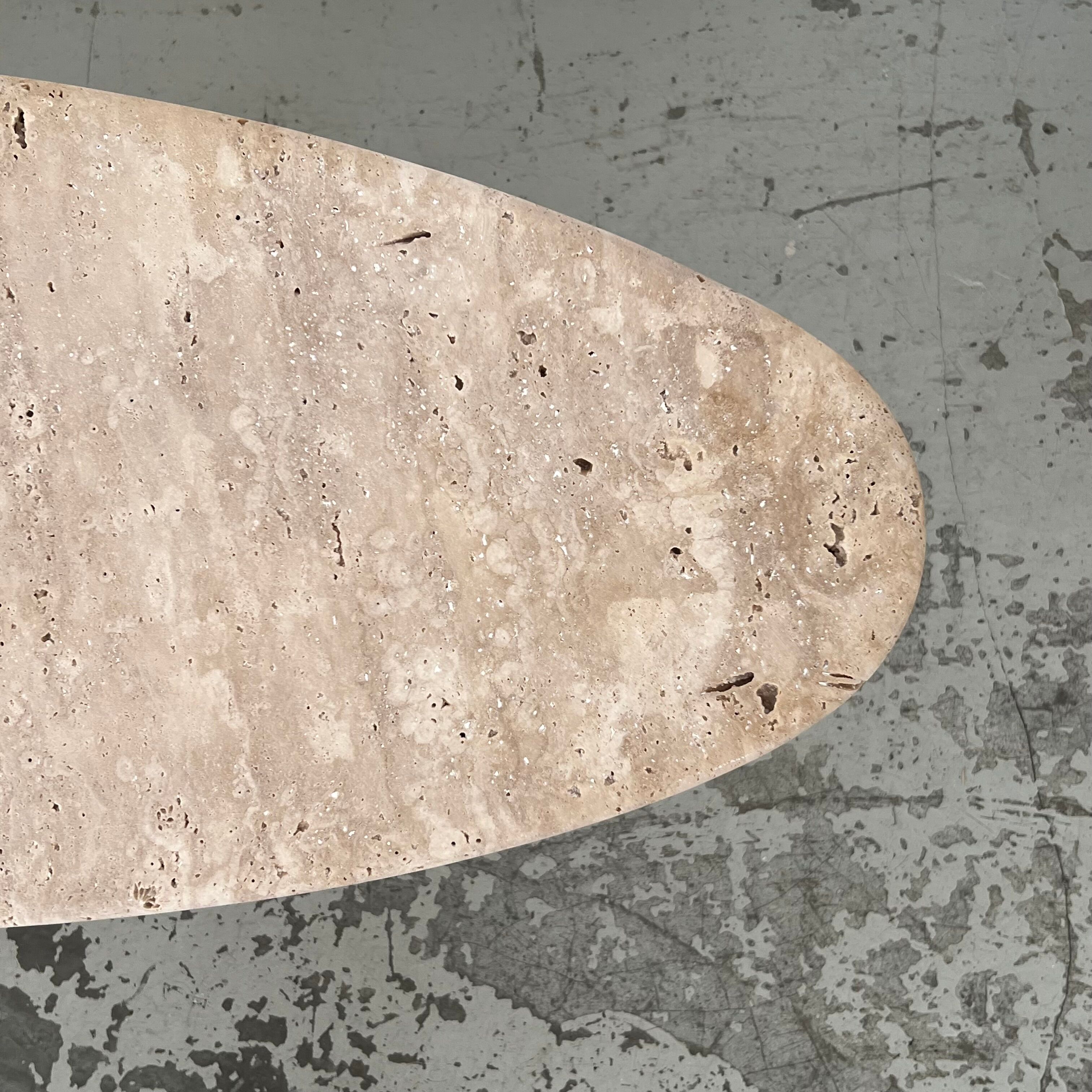 Oval travertine coffee table