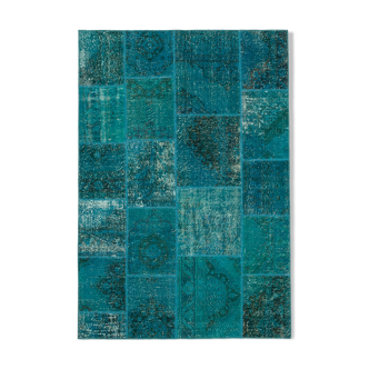 Handwoven anatolian rug 166 cm x 241 cm turquoise patchwork carpet