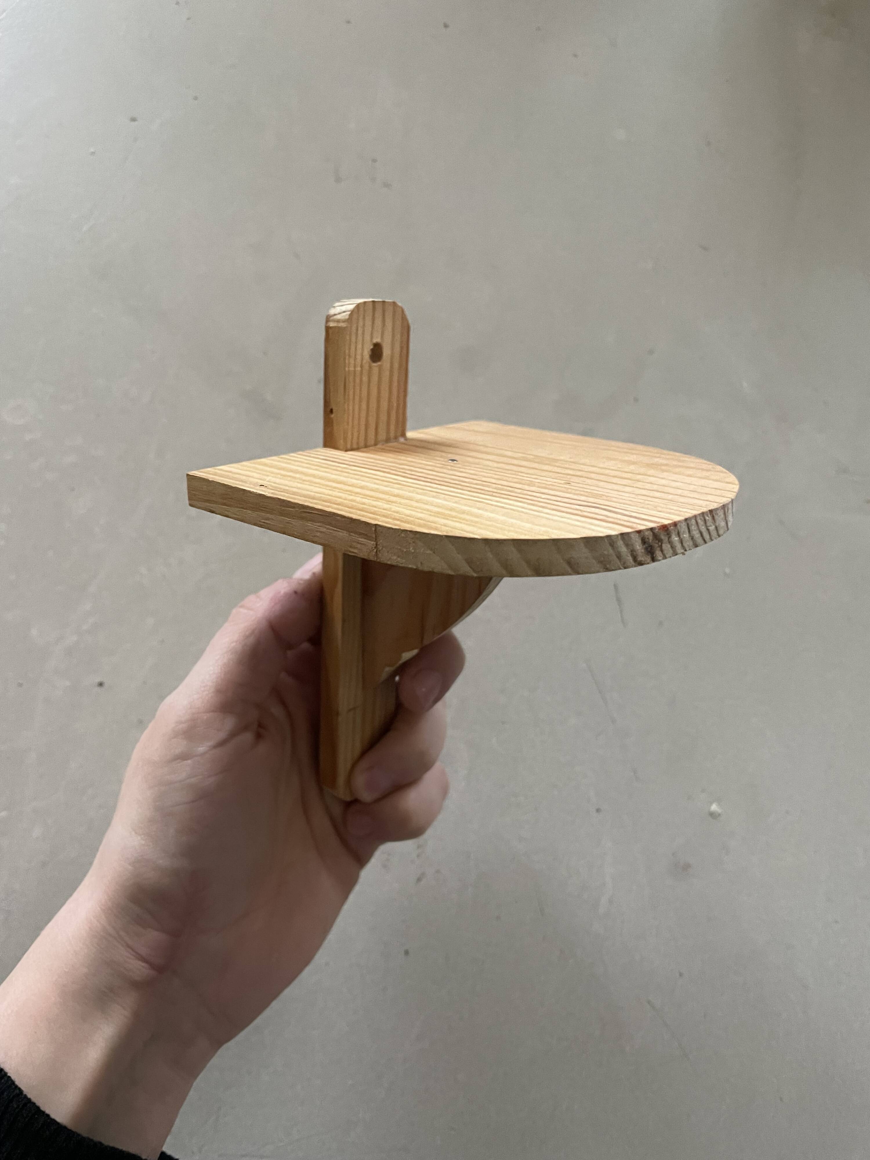 Small wall-mounted wooden shelf