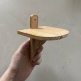 Small wall-mounted wooden shelf