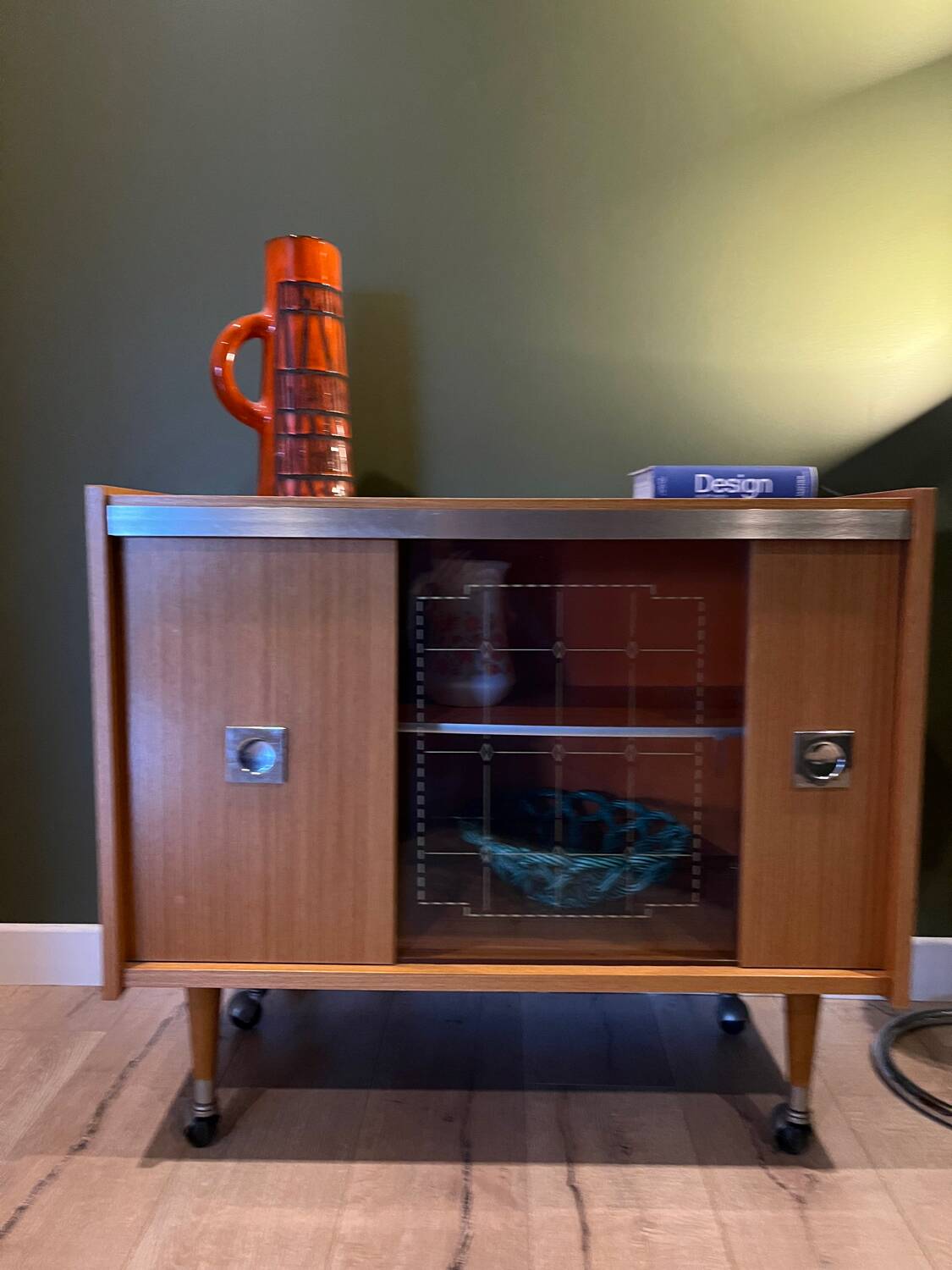 Vintage 1960s bar cabinet, Scandinavian style, on wheels.