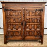Spanish furniture with carved wood profiles and coats of arms from the 1950s.