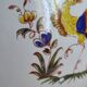 Saladier vintage faïence blanche oiseau exotique style Moustiers