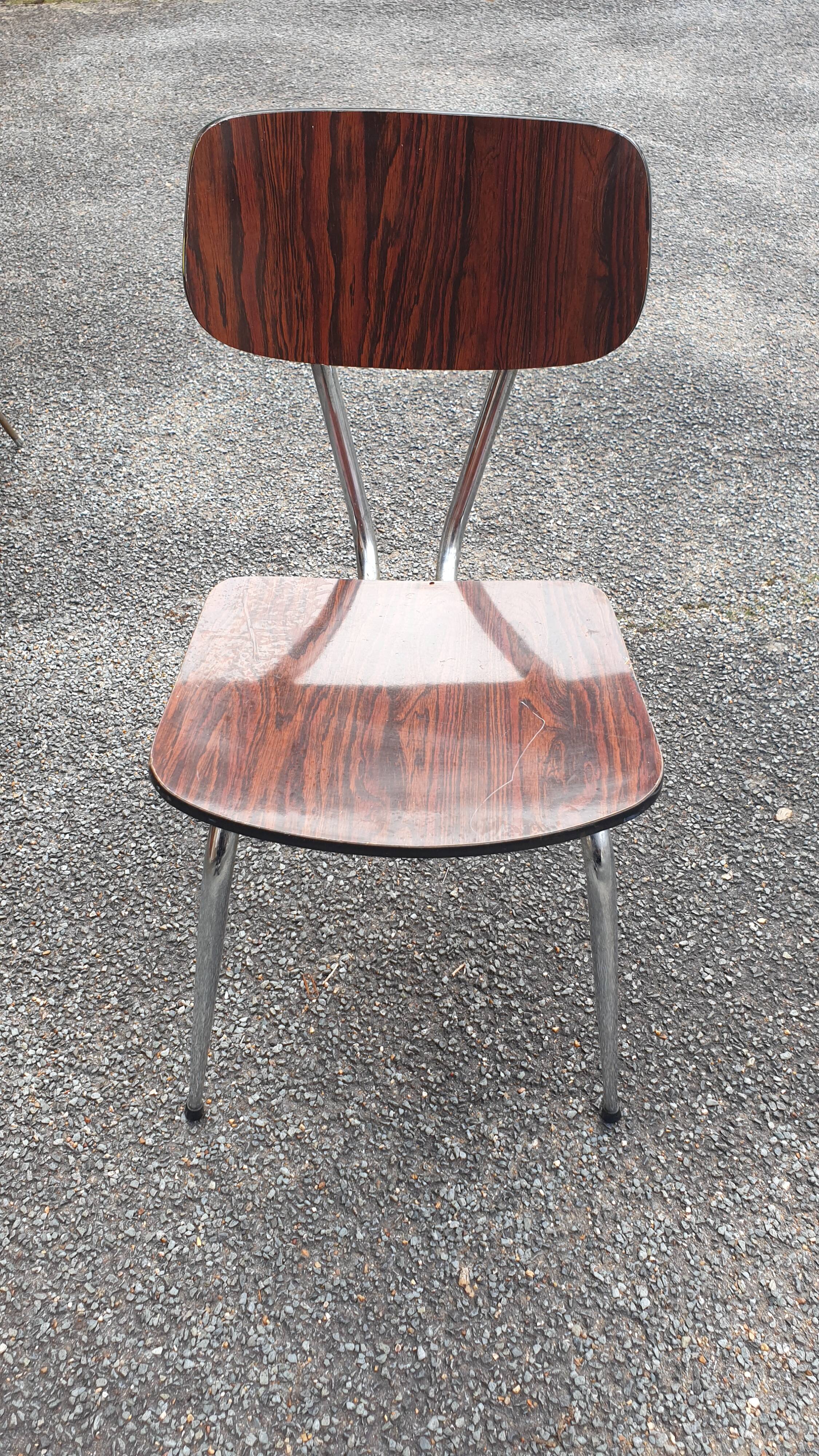 1 veined brown Formica chair