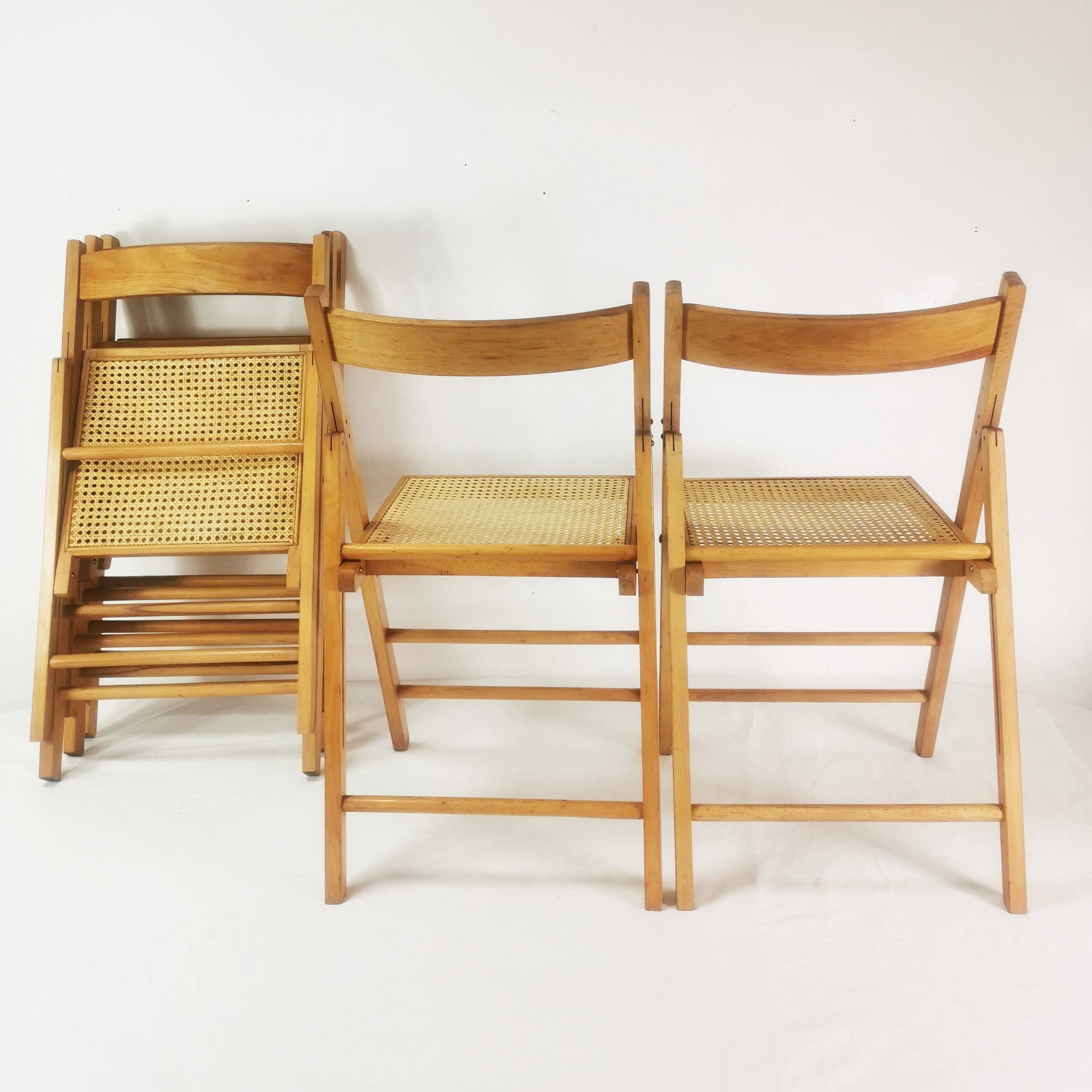 Set of folding chairs with raffia, Germany, 1980s.
