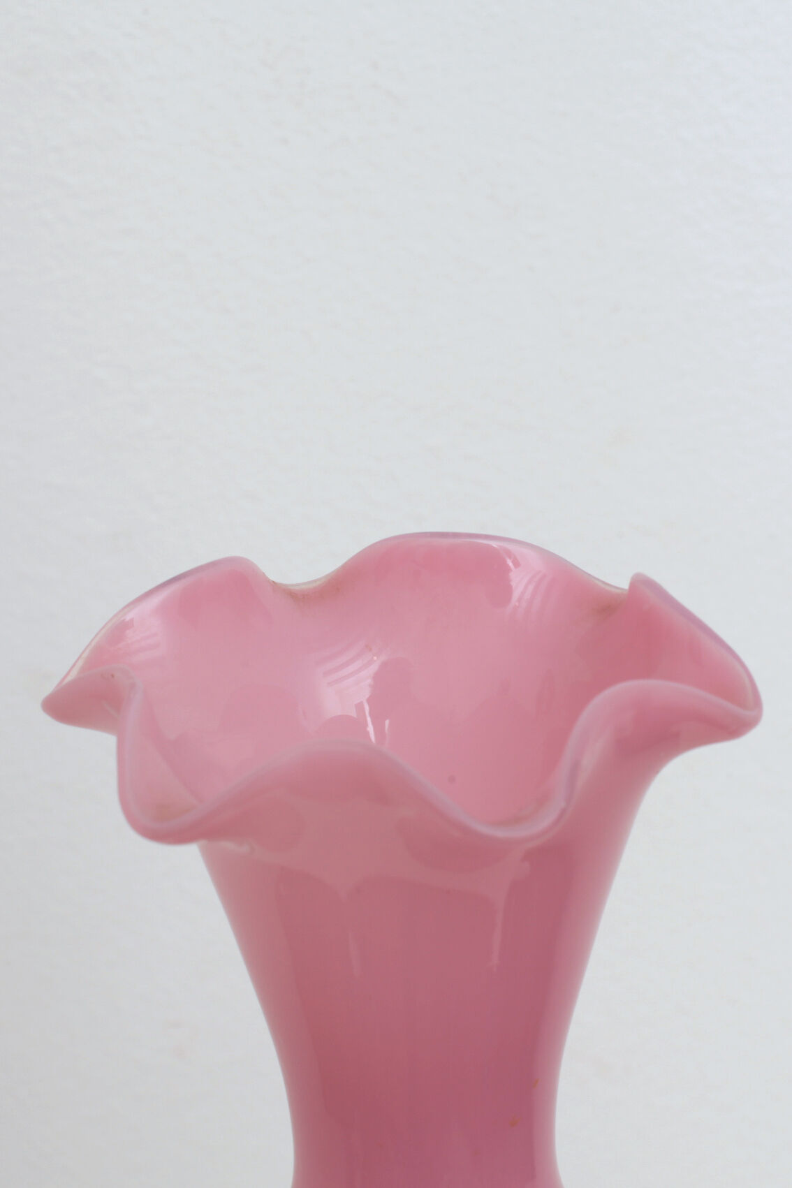 Pink vase foot twisted milk glass