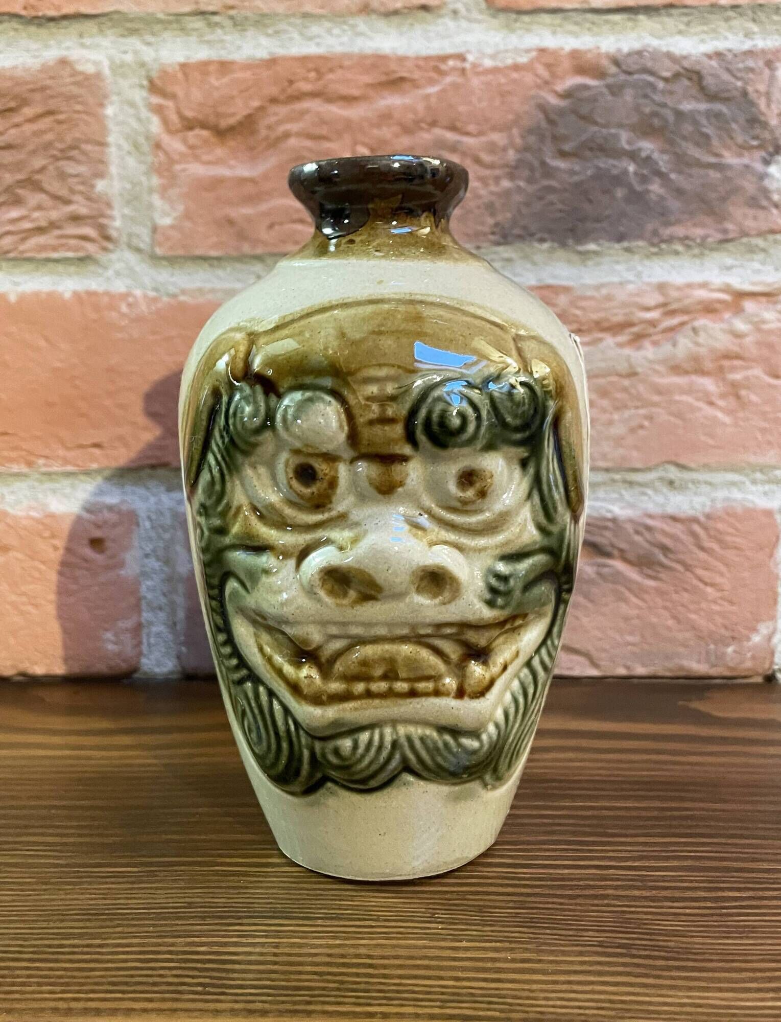 Japanese Awamori Bottle by the Helios Distillery (Okinawa) with Raised Lion and Dragon Design