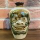 Japanese Awamori Bottle by the Helios Distillery (Okinawa) with Raised Lion and Dragon Design