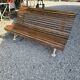 Garden bench with cast iron legs and oak slats