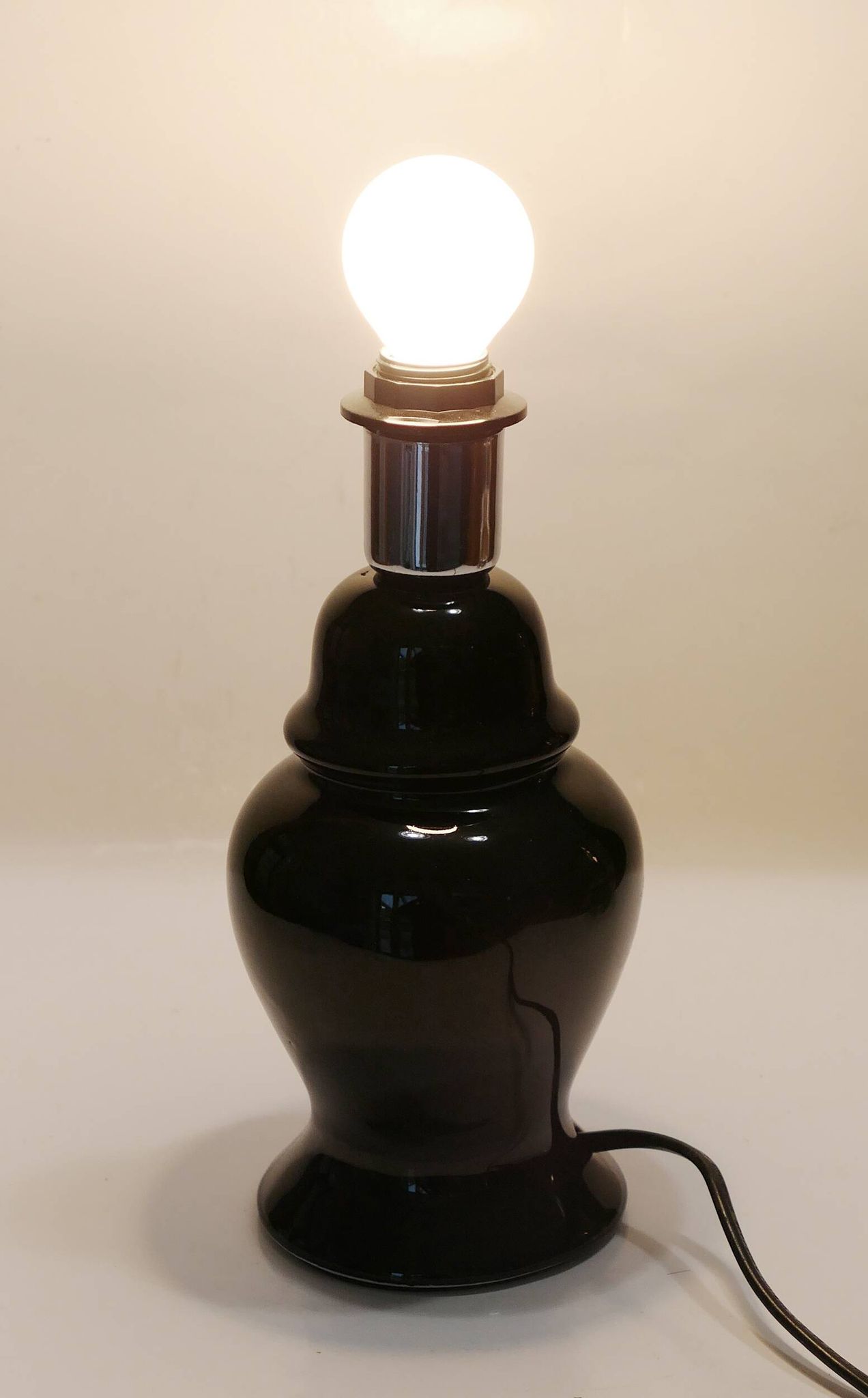 Elegant little vintage lamp base in black ceramic