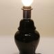 Elegant little vintage lamp base in black ceramic