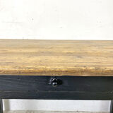 Varnished farmhouse table and blackened wood