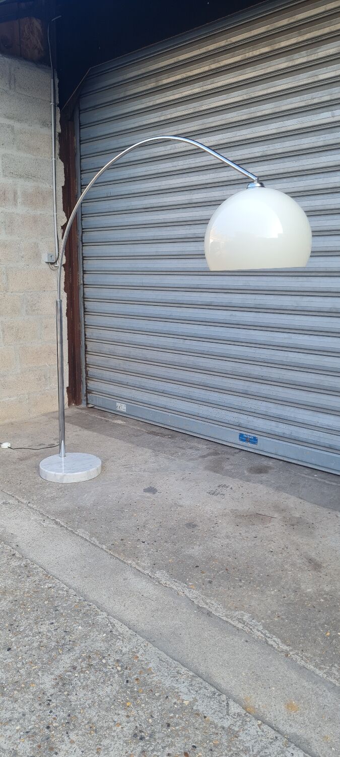 Arch floor lamp by Harvey guzzini 1970