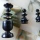 Onyx chessboard and complete wooden chess set.
