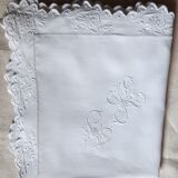 pillowcase embroidered with flowers and monogrammed festoons LK