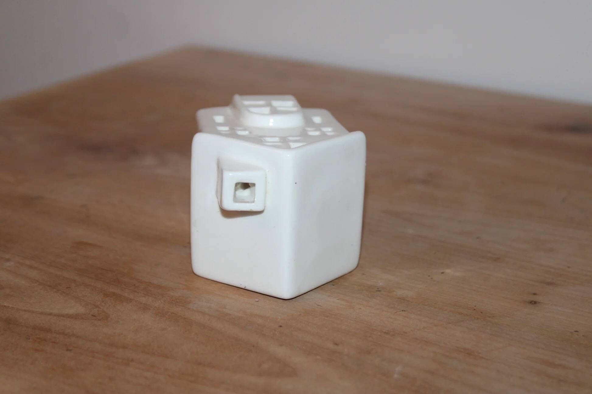 White perforated ceramic house lantern – Light decoration