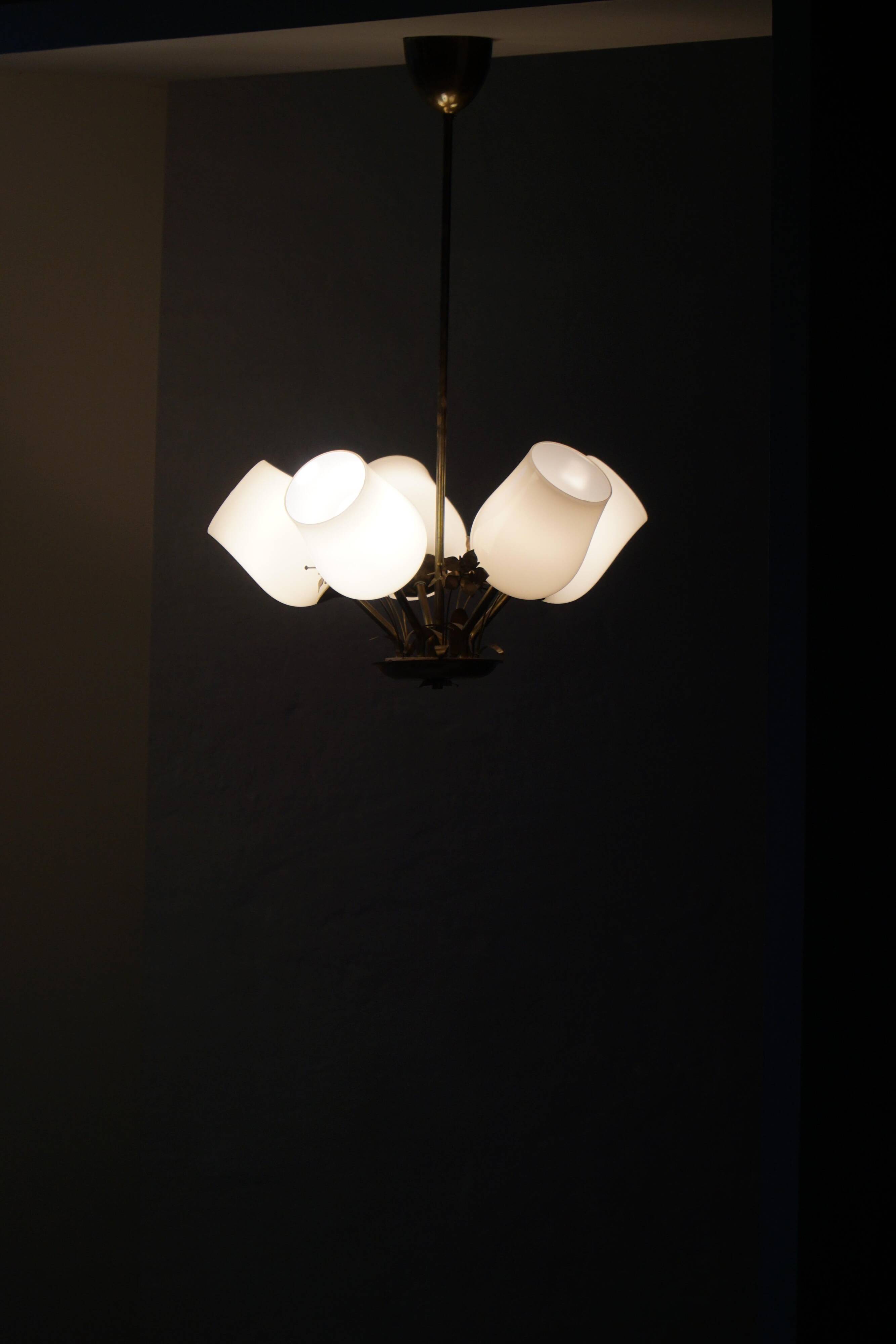 Five-branch brass and glass chandelier by Paavo Tynell for Idman OY Finland, 1940s.