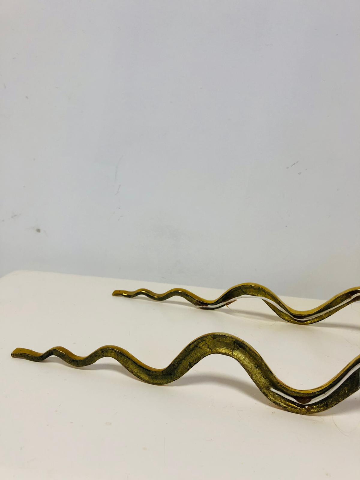 Pair of gilded bronze wall lamps