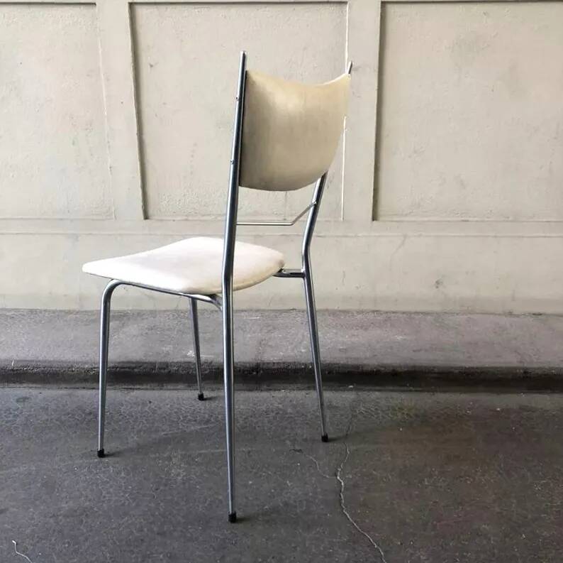 Vintage cream faux leather chair