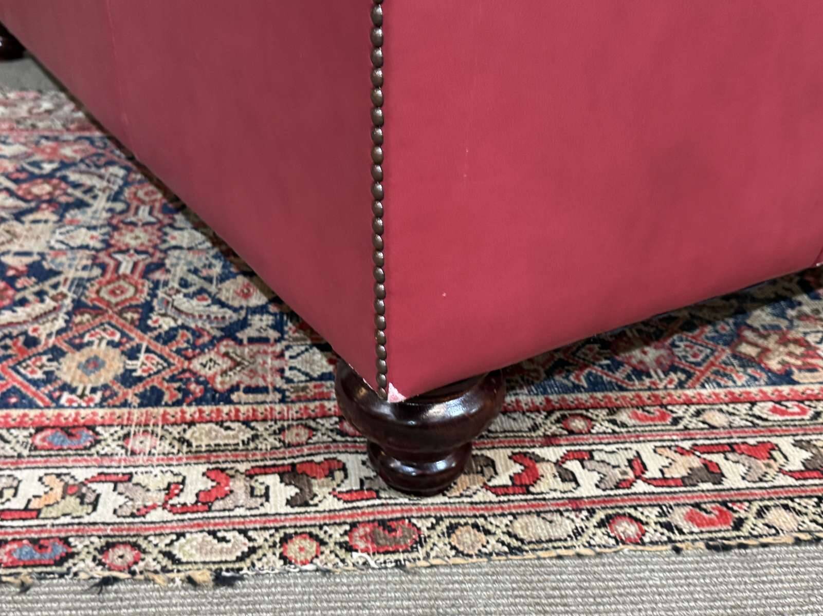 Chesterfield 2-seater leather sofa, modern production from the 2000s.