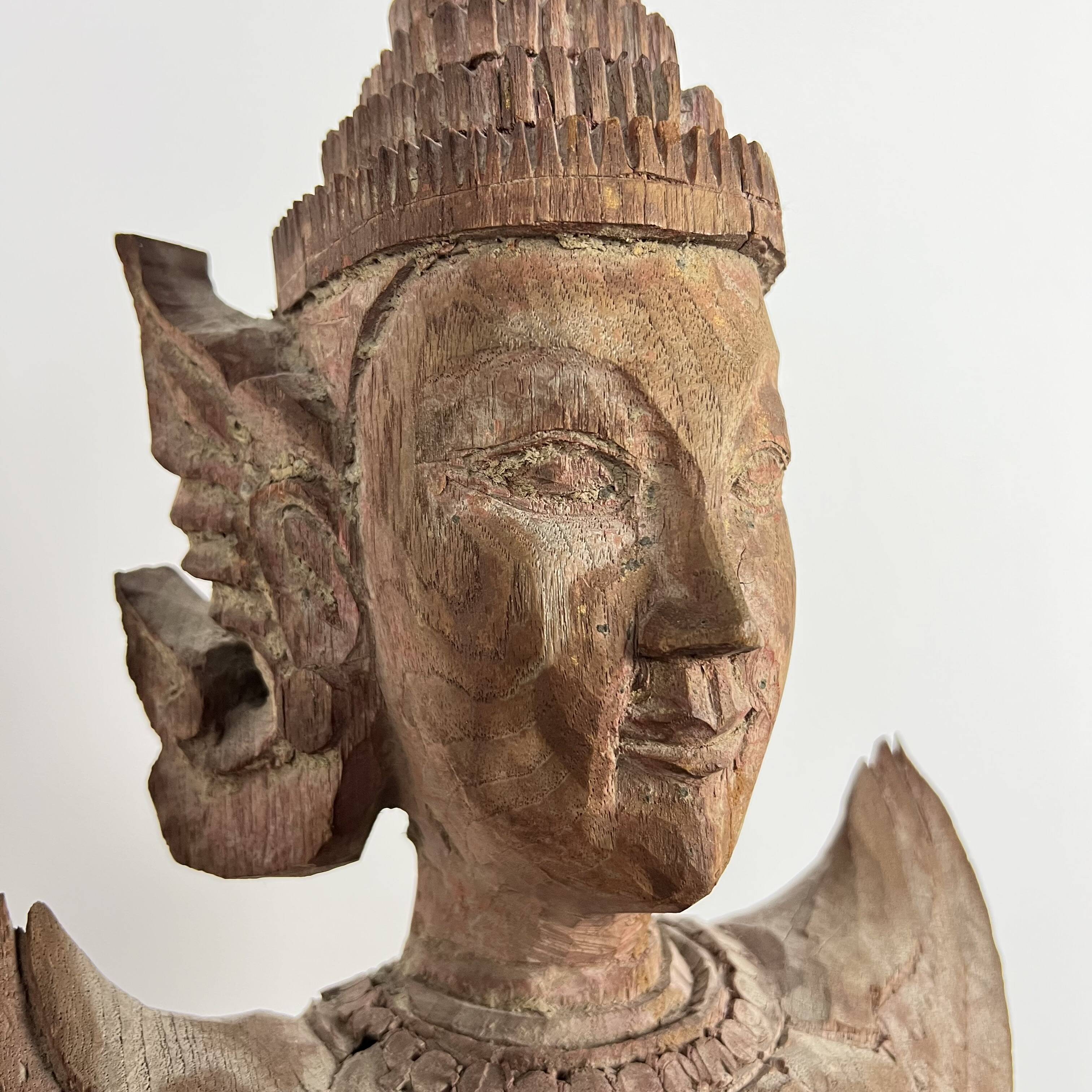 Grande statuette de kinaree, adorant, devi en bois sculpté. Thailande