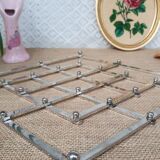 Stretchy silver metal flat bottom