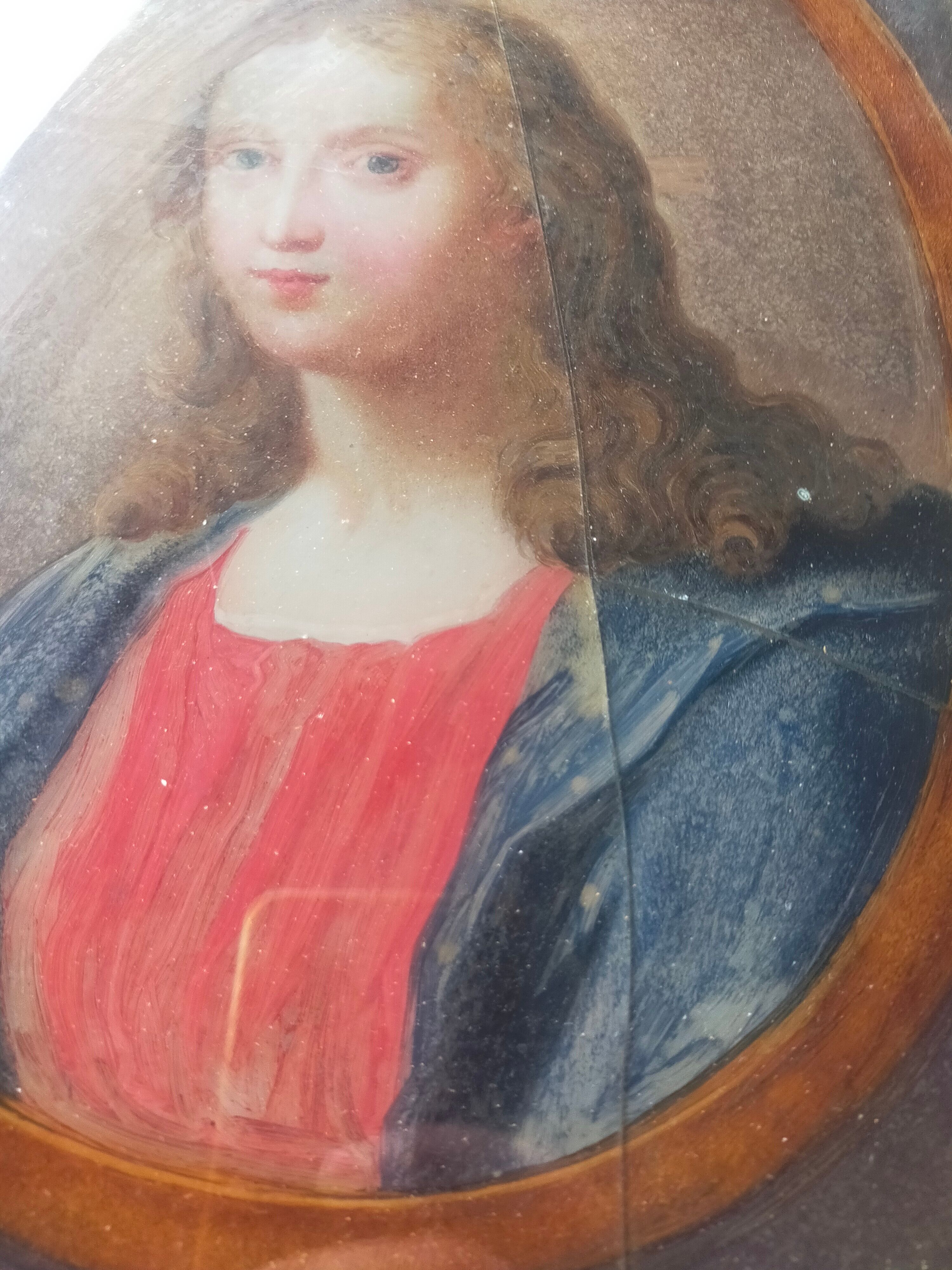 Ancient painting on glass depicting a female figure XVlll century