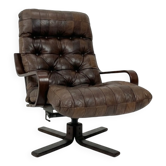 Fauteuil pivotant en cuir  mid-century