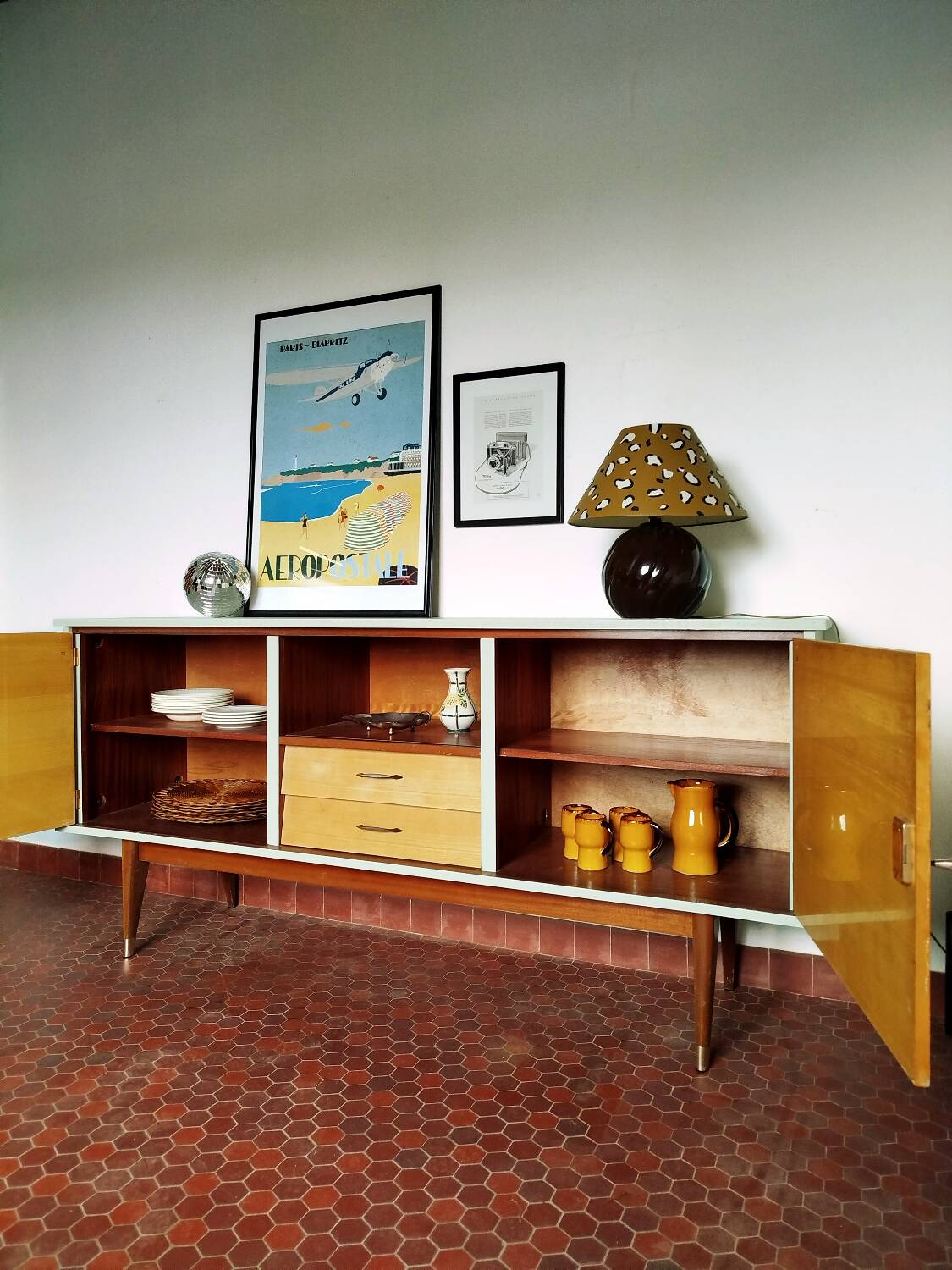 Wooden sideboard in soft green