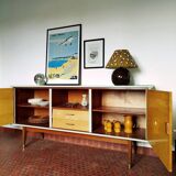 Wooden sideboard in soft green