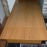Brown formica table with 2 extension cords and drawer
