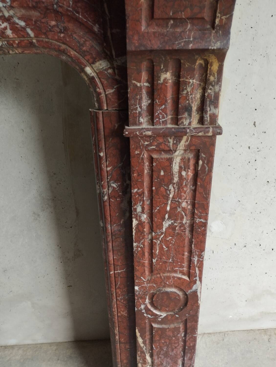 Old Louis XV red marble fireplace