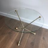 Round coffee table of neoclassical style in brass