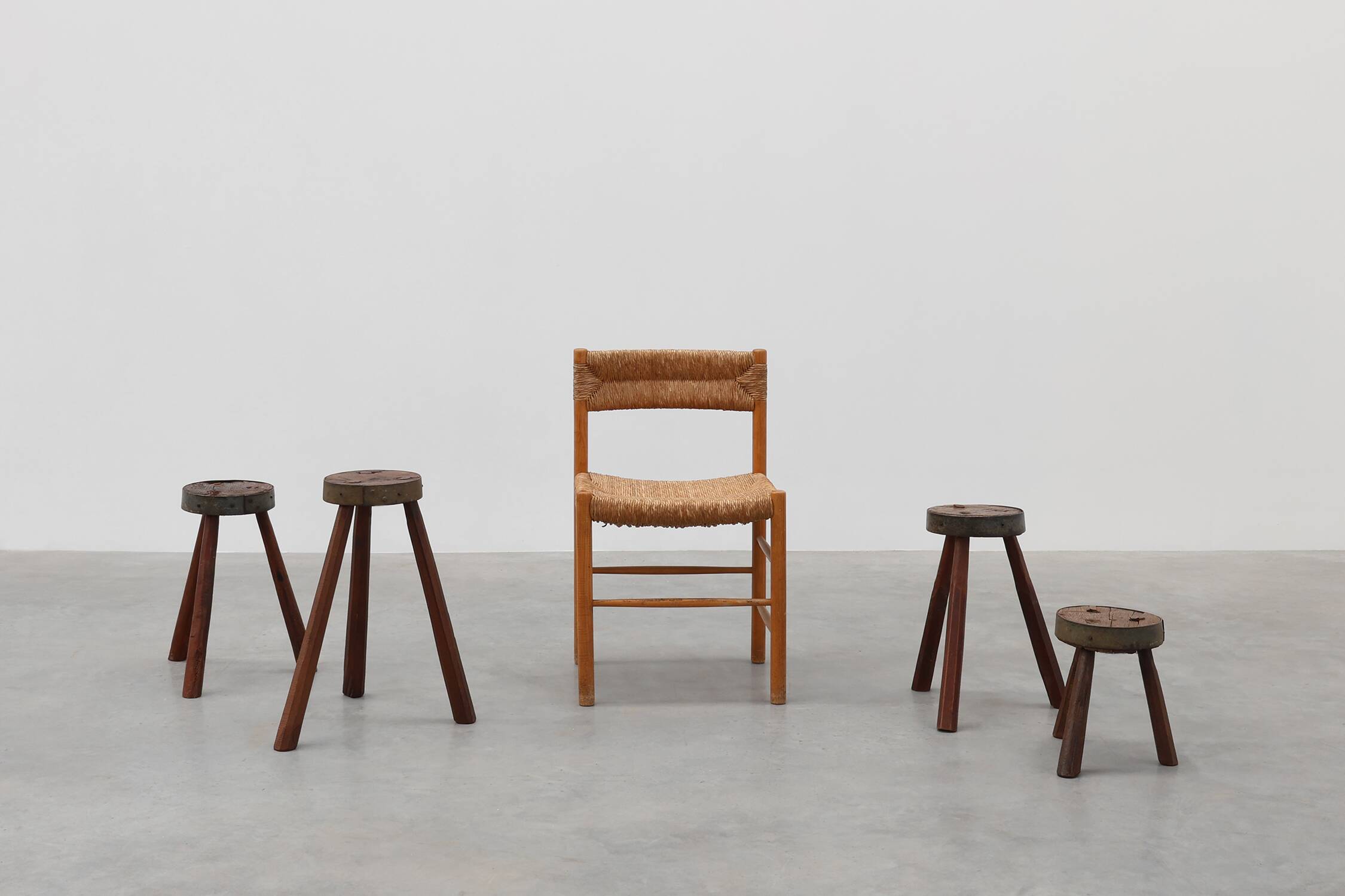 Brutalist French 1850s solid oak tripod stools with metal rim, set of 4