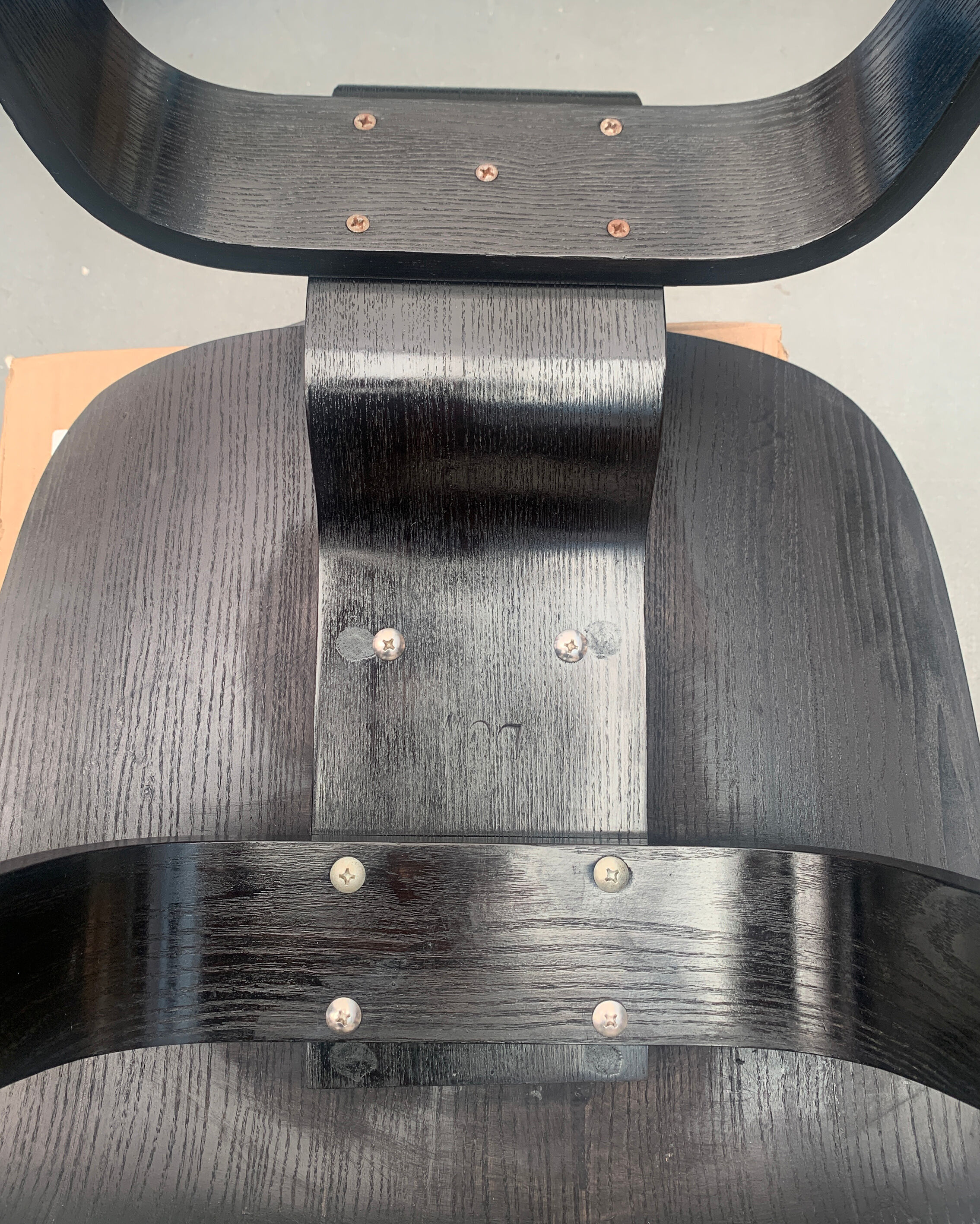 Pair of DCW chairs by Charles & Ray Eames in Black for Herman Miller 1950