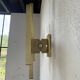 Pair of Regency brass wall lights in Italy