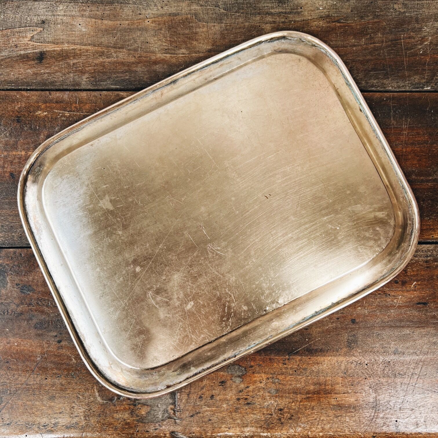 Golden and chiseled brass serving tray