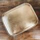 Golden and chiseled brass serving tray