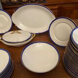 Limoges porcelain table service with blue band on white and gold background
