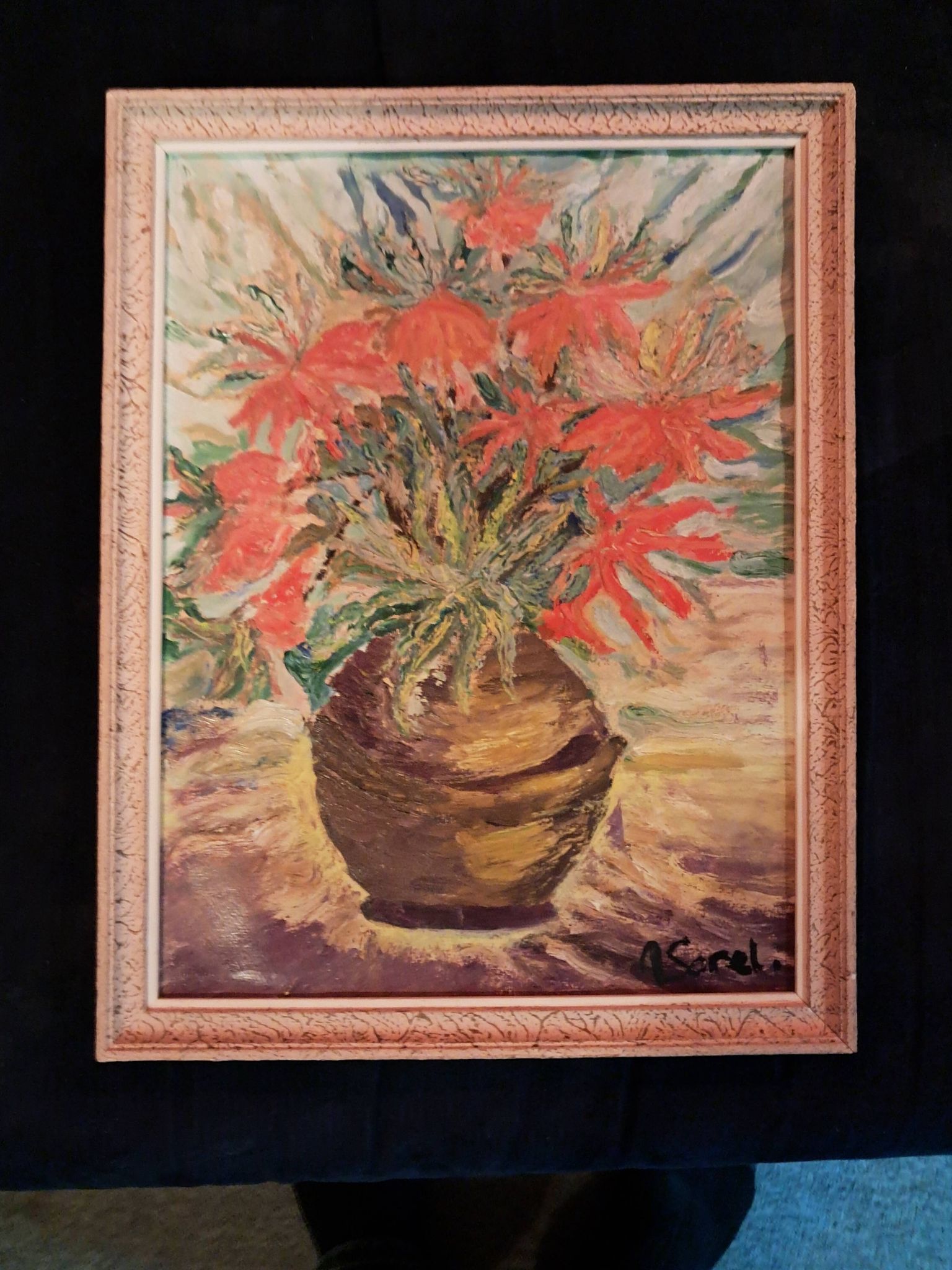 An old oil painting depicting a bouquet of flowers.