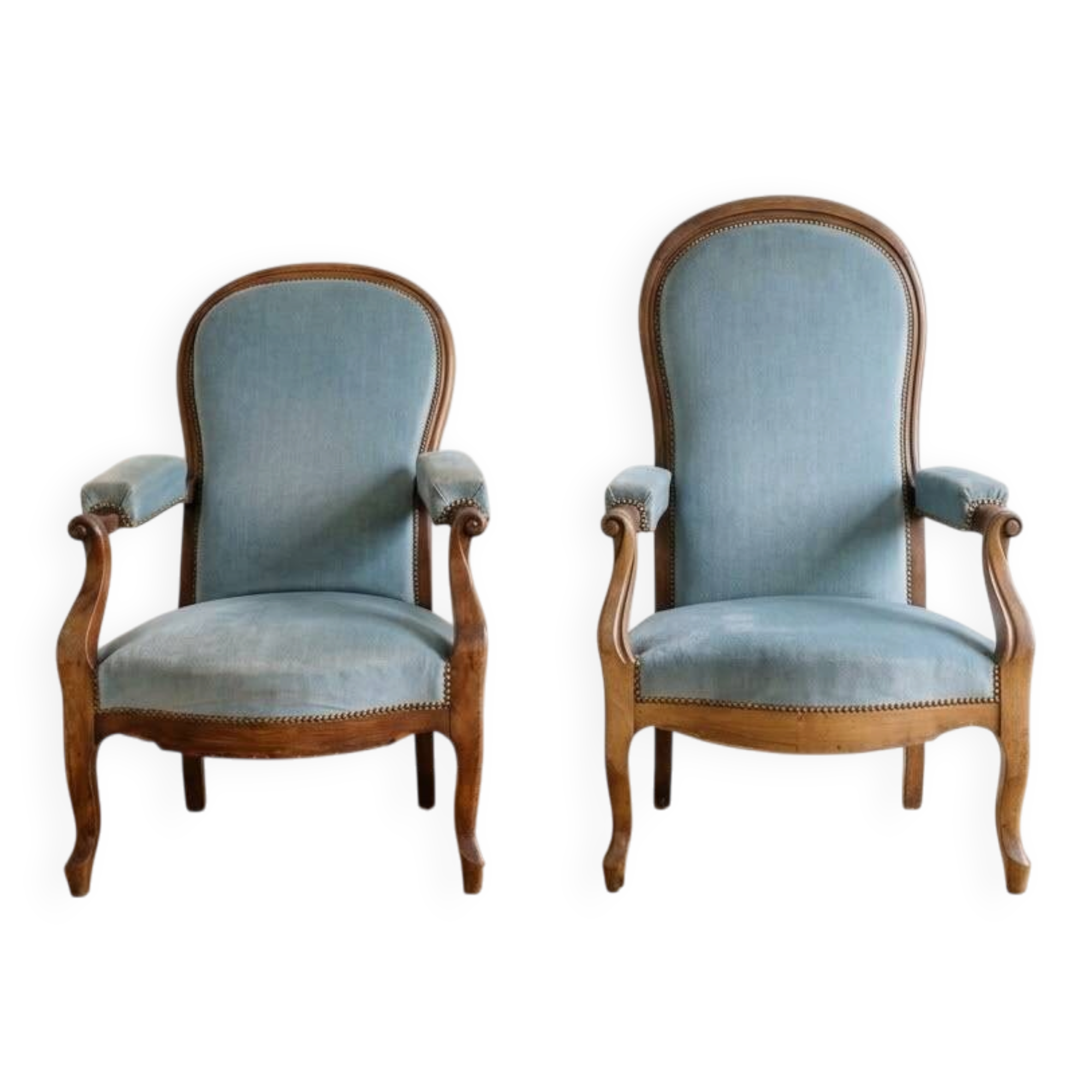 Pair of Louis XV reclining Voltaire armchairs in blue fabric.