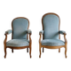 Pair of Louis XV reclining Voltaire armchairs in blue fabric.
