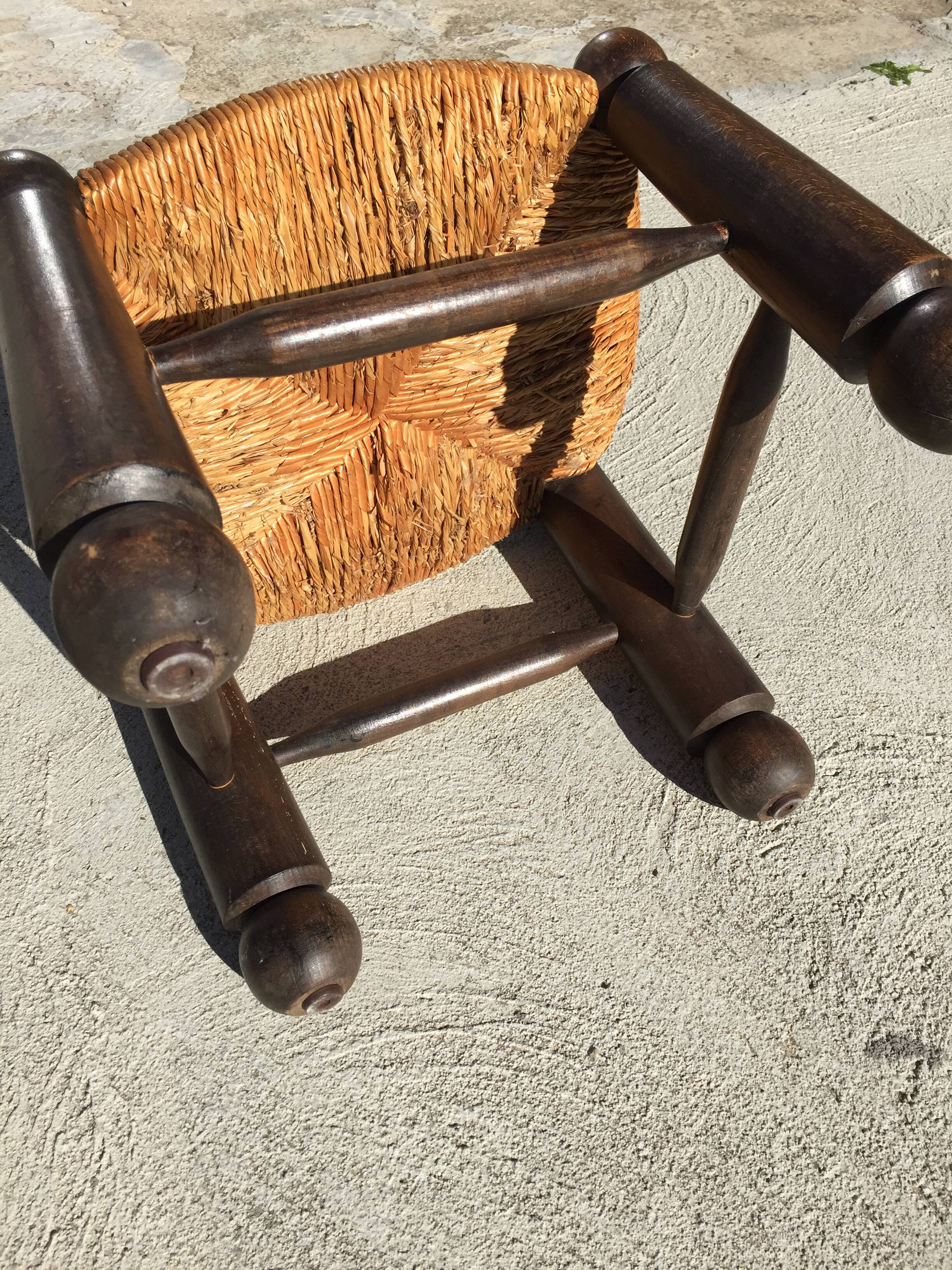 Straw low chair in the style of Charles Dudouyt