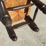 Straw low chair in the style of Charles Dudouyt