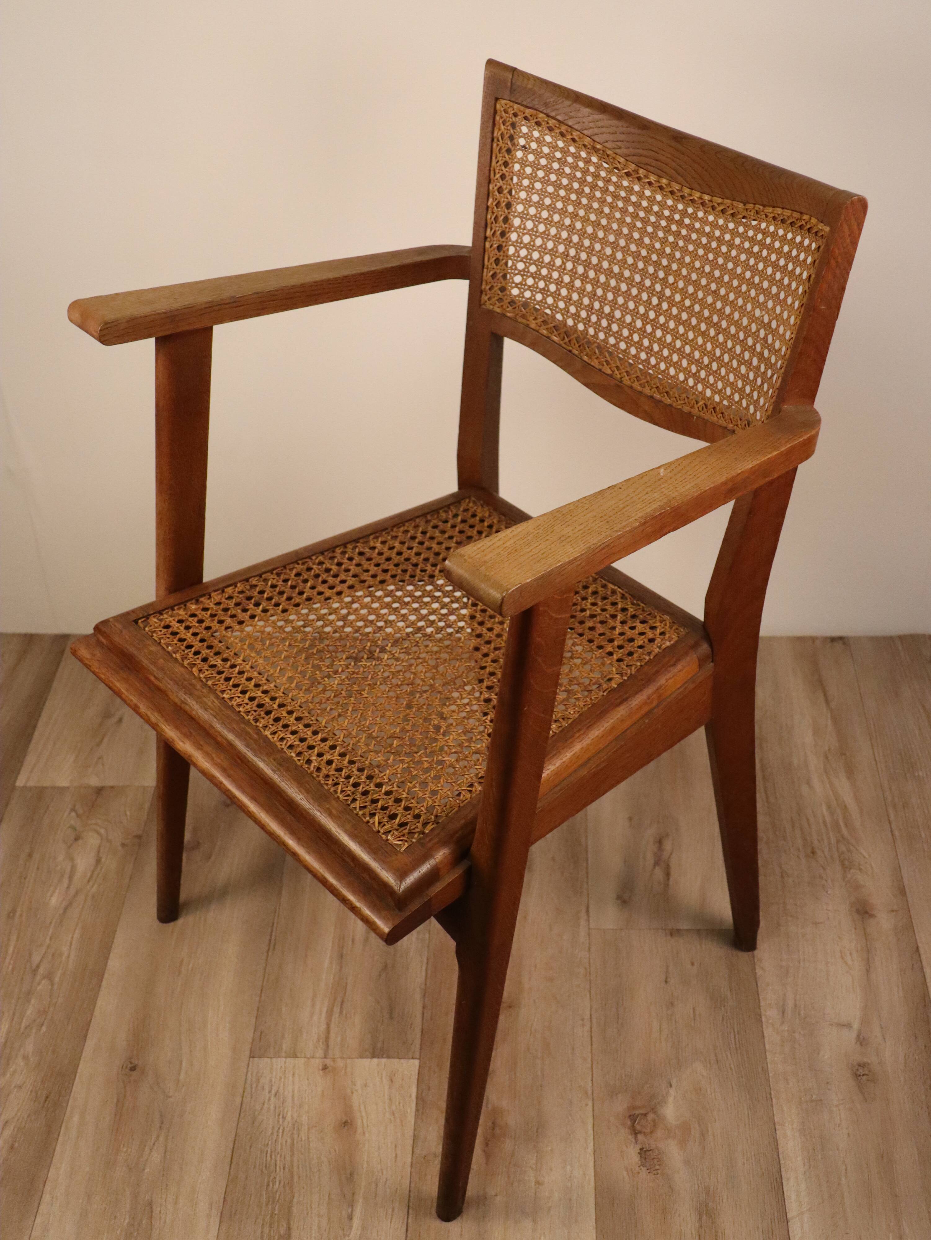 Vintage wooden armchair and canning 1950